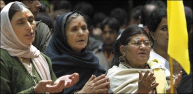 Displaced Kashmiri Pandit women pray for peace and an early return home at an annual Hindu festival: BBC.