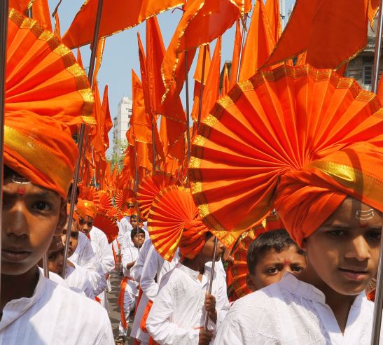Huge procession of the New Year of Hindu calendar Auspicious day " Gudi Padwa " with traditionally dressed men and Beauties rides bikes in the at Girguam in Mumbai on Monday .